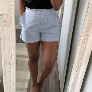 Seersucker shorts with ruffle detailing